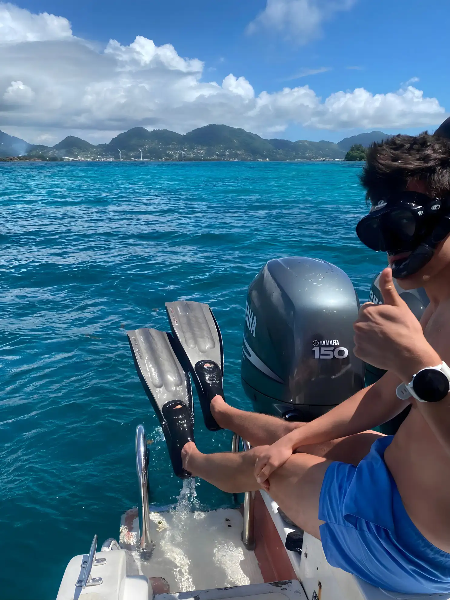 Guest preparing to snorkel from a Dolphin Nemo boat